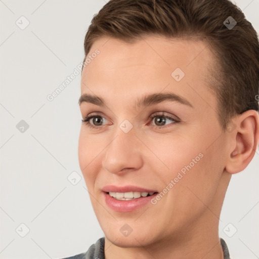 Joyful white young-adult female with short  brown hair and brown eyes