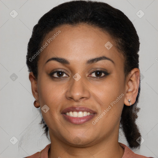 Joyful latino young-adult female with medium  brown hair and brown eyes