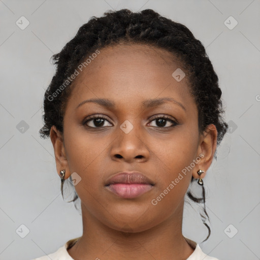 Neutral black young-adult female with short  brown hair and brown eyes