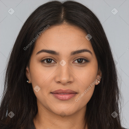 Joyful latino young-adult female with long  brown hair and brown eyes