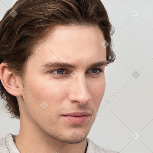 Neutral white young-adult male with short  brown hair and grey eyes