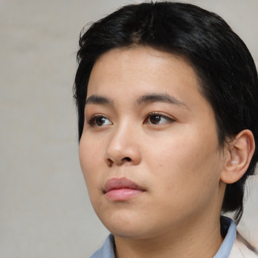 Neutral asian young-adult female with medium  black hair and brown eyes
