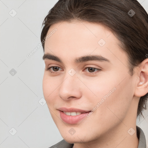 Joyful white young-adult male with medium  brown hair and brown eyes