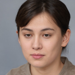 Neutral white young-adult female with short  brown hair and brown eyes