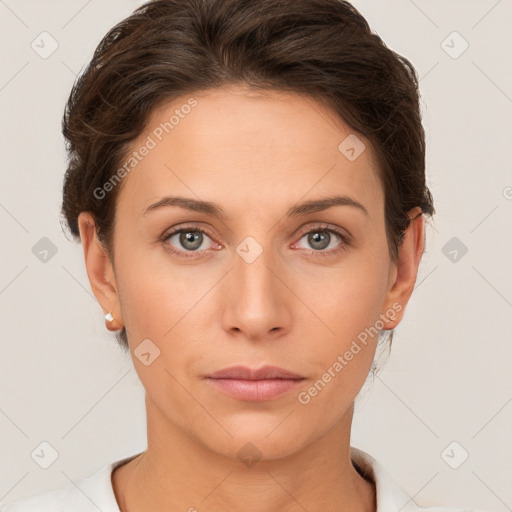 Neutral white young-adult female with short  brown hair and brown eyes