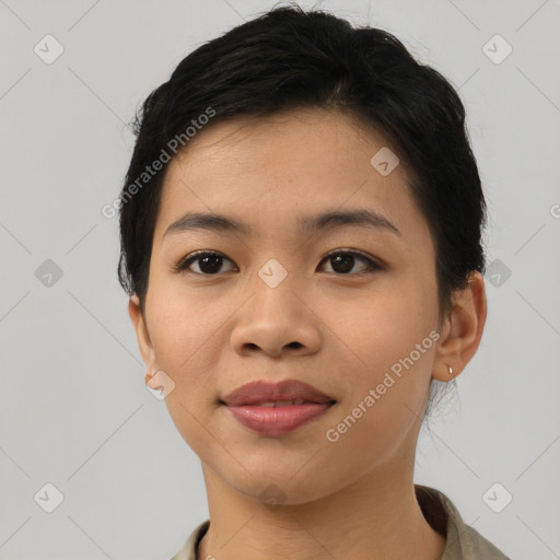 Joyful asian young-adult female with short  brown hair and brown eyes