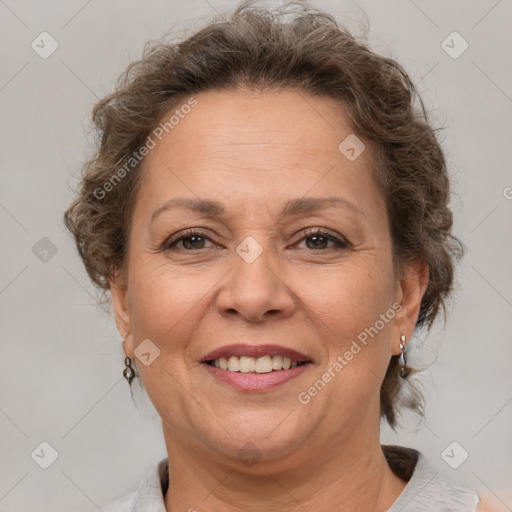 Joyful white adult female with short  brown hair and brown eyes