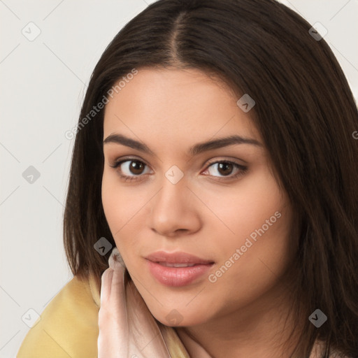 Neutral white young-adult female with long  brown hair and brown eyes