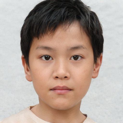 Neutral asian child male with short  brown hair and brown eyes