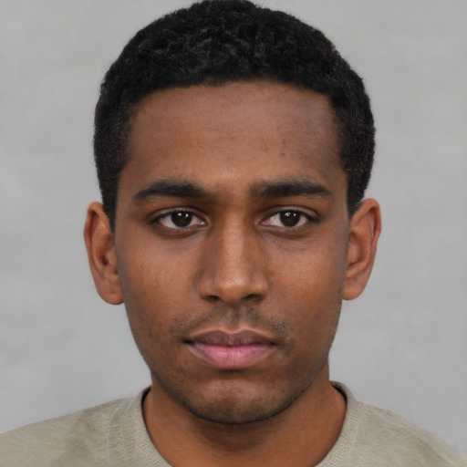 Neutral black young-adult male with short  black hair and brown eyes