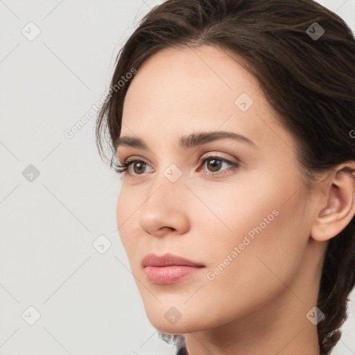 Neutral white young-adult female with medium  brown hair and brown eyes