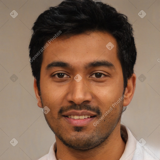 Joyful latino young-adult male with short  black hair and brown eyes