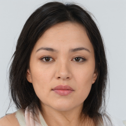 Neutral asian young-adult female with medium  brown hair and brown eyes