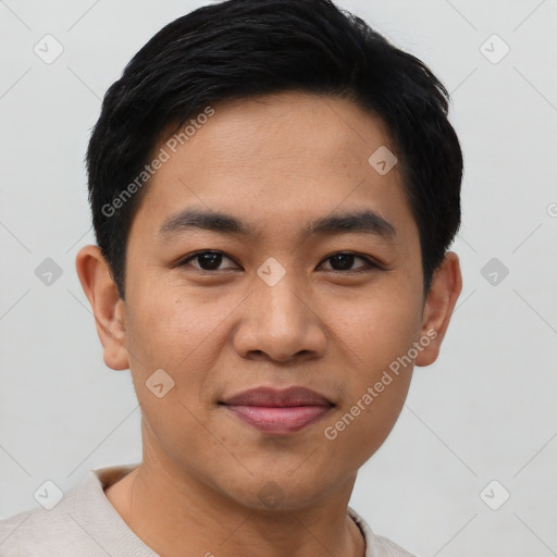 Joyful asian young-adult male with short  black hair and brown eyes