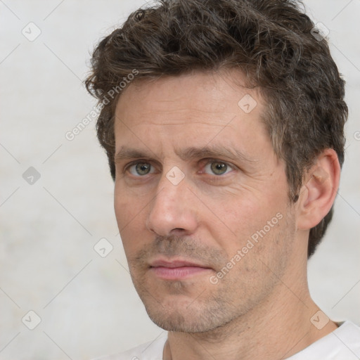 Neutral white adult male with short  brown hair and brown eyes