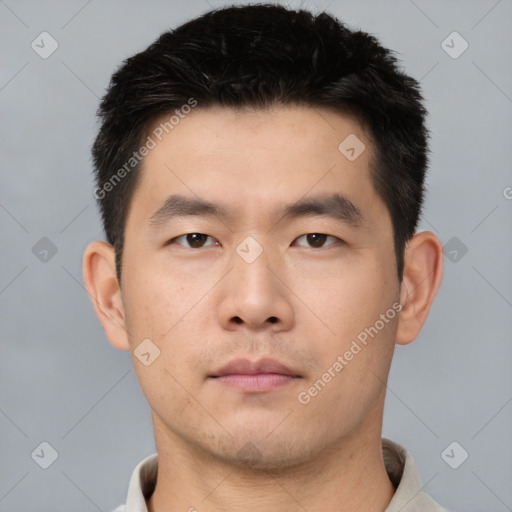 Neutral asian young-adult male with short  black hair and brown eyes