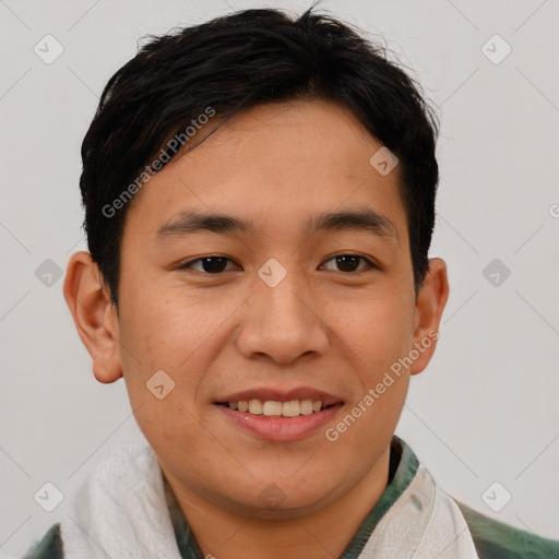 Joyful asian young-adult male with short  brown hair and brown eyes