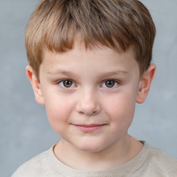 Joyful white child male with short  brown hair and grey eyes