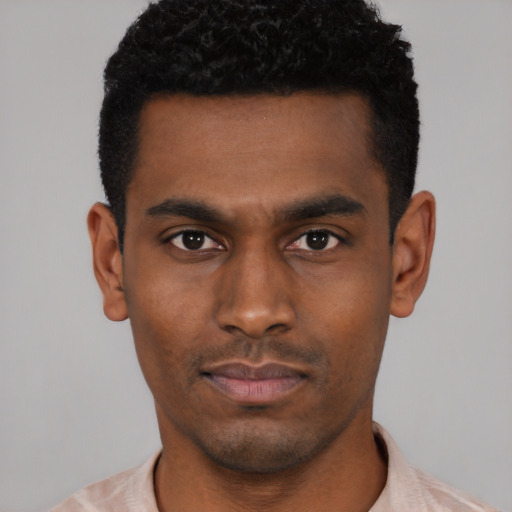 Neutral black young-adult male with short  black hair and brown eyes