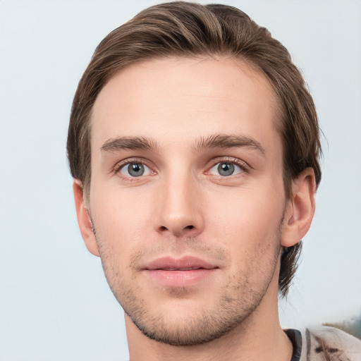 Neutral white young-adult male with short  brown hair and grey eyes