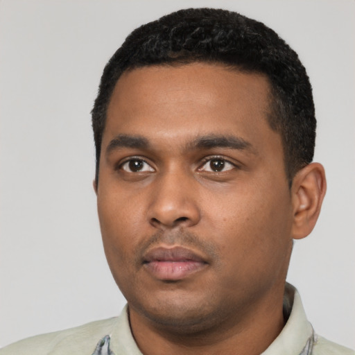 Neutral black young-adult male with short  black hair and brown eyes