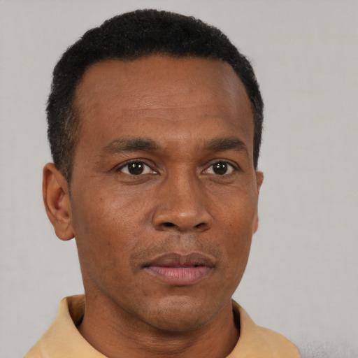 Neutral black young-adult male with short  brown hair and brown eyes