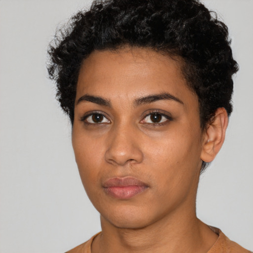 Neutral latino young-adult female with short  black hair and brown eyes