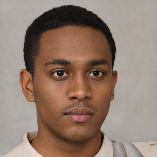 Neutral latino young-adult male with short  brown hair and brown eyes