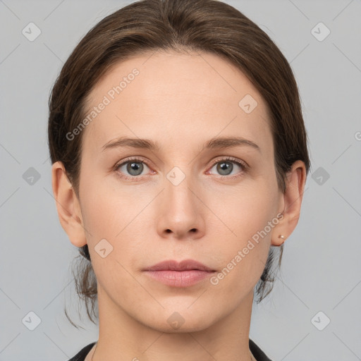 Neutral white young-adult female with medium  brown hair and grey eyes