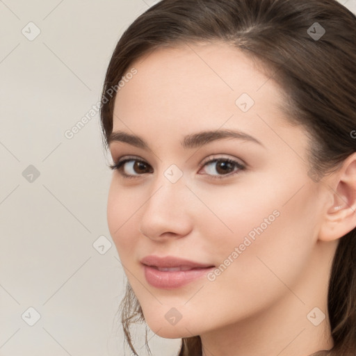 Neutral white young-adult female with long  brown hair and brown eyes