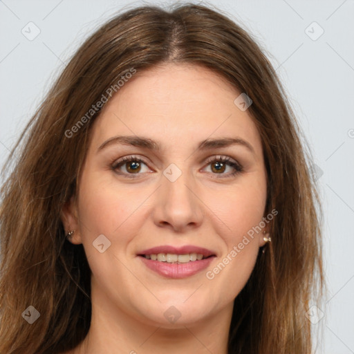 Joyful white young-adult female with long  brown hair and brown eyes