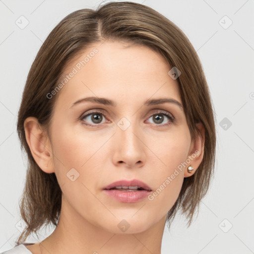 Neutral white young-adult female with medium  brown hair and grey eyes