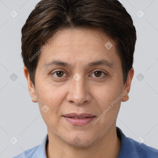 Joyful white adult female with short  brown hair and brown eyes