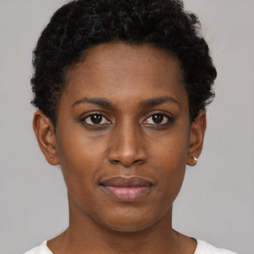 Neutral black young-adult female with short  brown hair and brown eyes