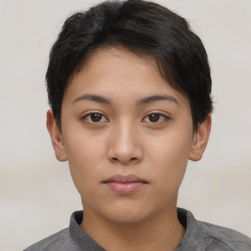 Neutral asian young-adult female with short  brown hair and brown eyes