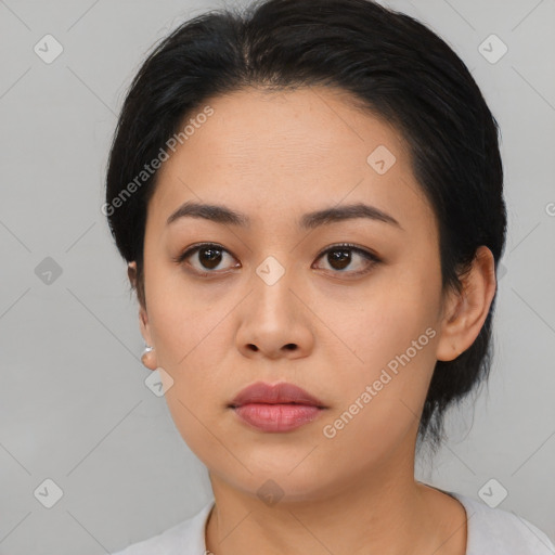 Neutral asian young-adult female with medium  black hair and brown eyes