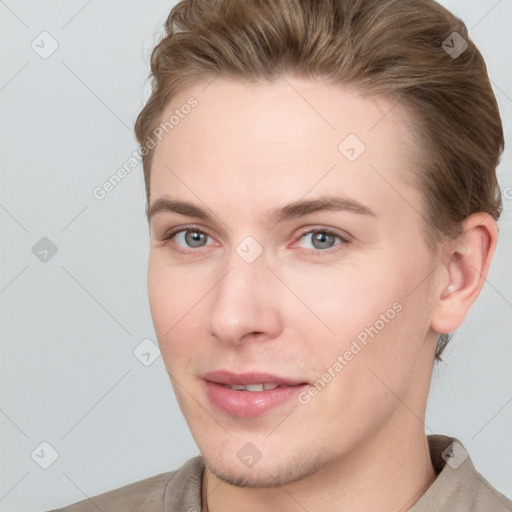 Joyful white young-adult female with short  brown hair and grey eyes