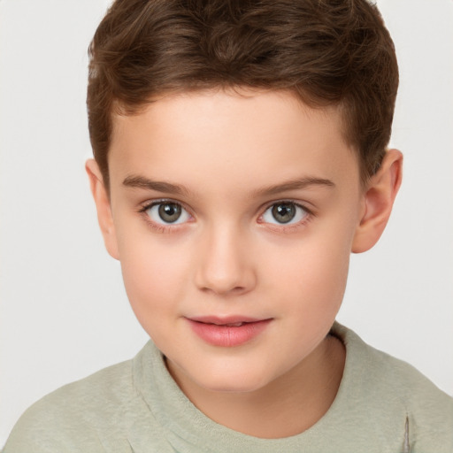 Joyful white child female with short  brown hair and brown eyes