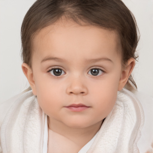 Neutral white child female with medium  brown hair and brown eyes