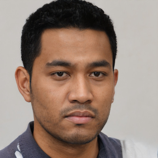 Neutral asian young-adult male with short  black hair and brown eyes