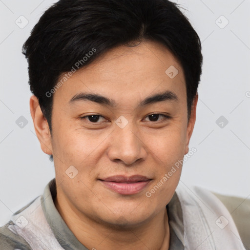 Joyful asian young-adult male with short  brown hair and brown eyes