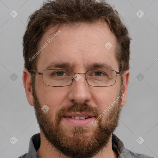 Joyful white adult male with short  brown hair and grey eyes