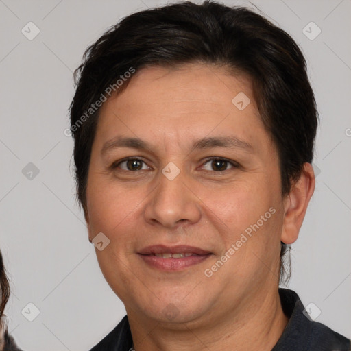 Joyful white adult female with short  brown hair and brown eyes