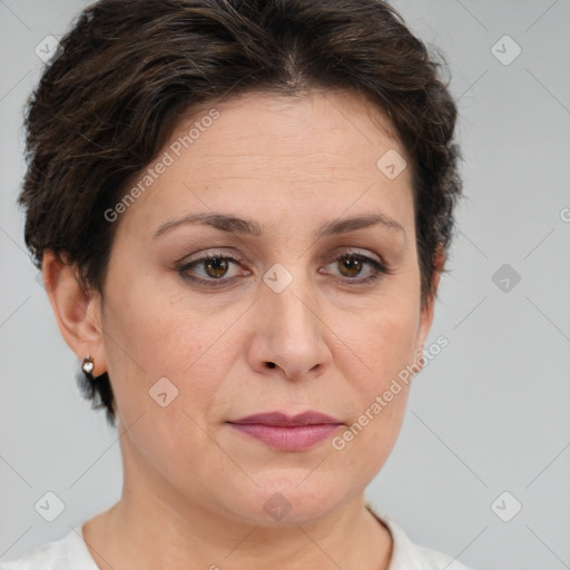 Joyful white adult female with short  brown hair and brown eyes