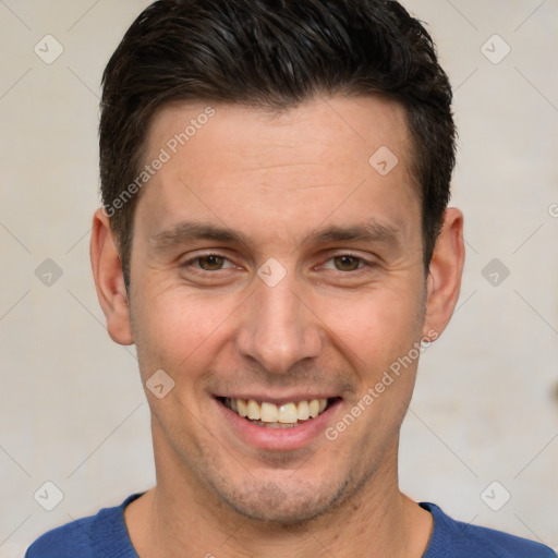 Joyful white adult male with short  brown hair and brown eyes