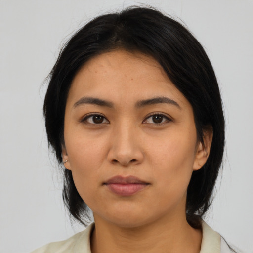 Neutral asian young-adult female with medium  black hair and brown eyes
