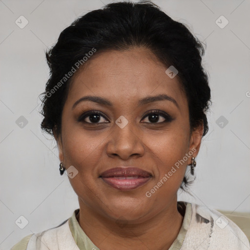 Joyful black adult female with medium  brown hair and brown eyes