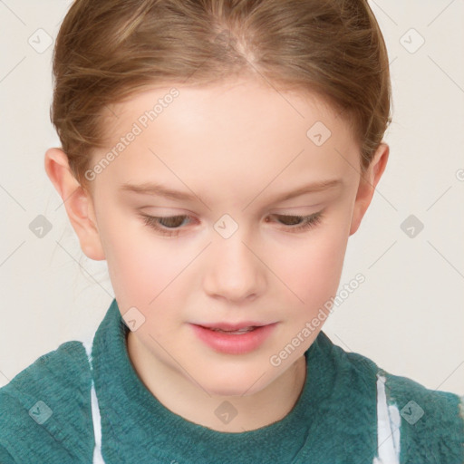 Joyful white child female with short  brown hair and brown eyes