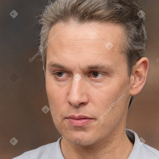 Neutral white adult male with short  brown hair and brown eyes