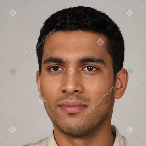 Neutral latino young-adult male with short  black hair and brown eyes